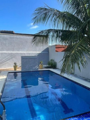 Casa na praia com piscina